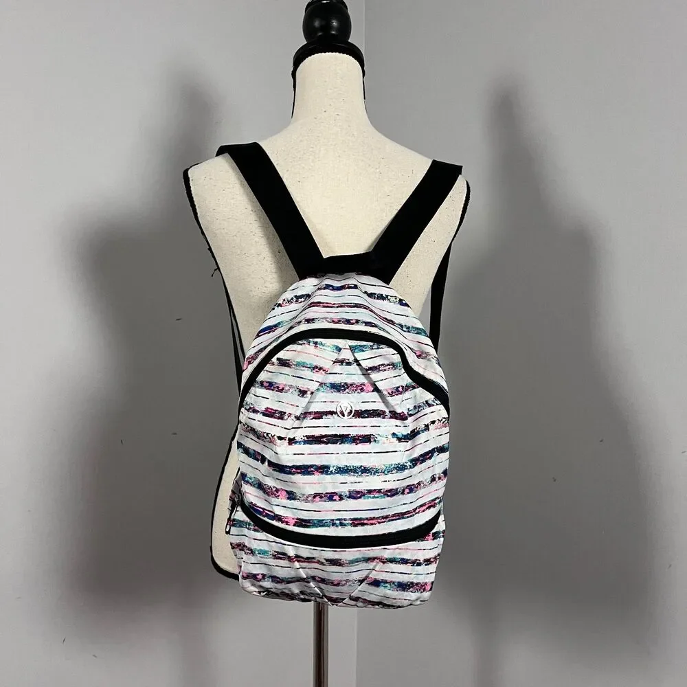 Ivivva by Lululemon Girl's Active Small Backpack Multi Stripe Bottom Shoe Pocket